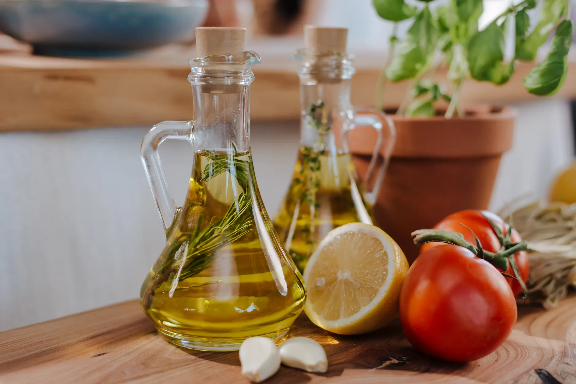 Fresh chopped vegetables with olive oil and basil, ingredients for Italian cooking.